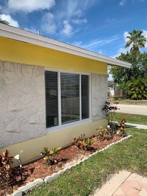 New impact window on a Broward County home exterior
